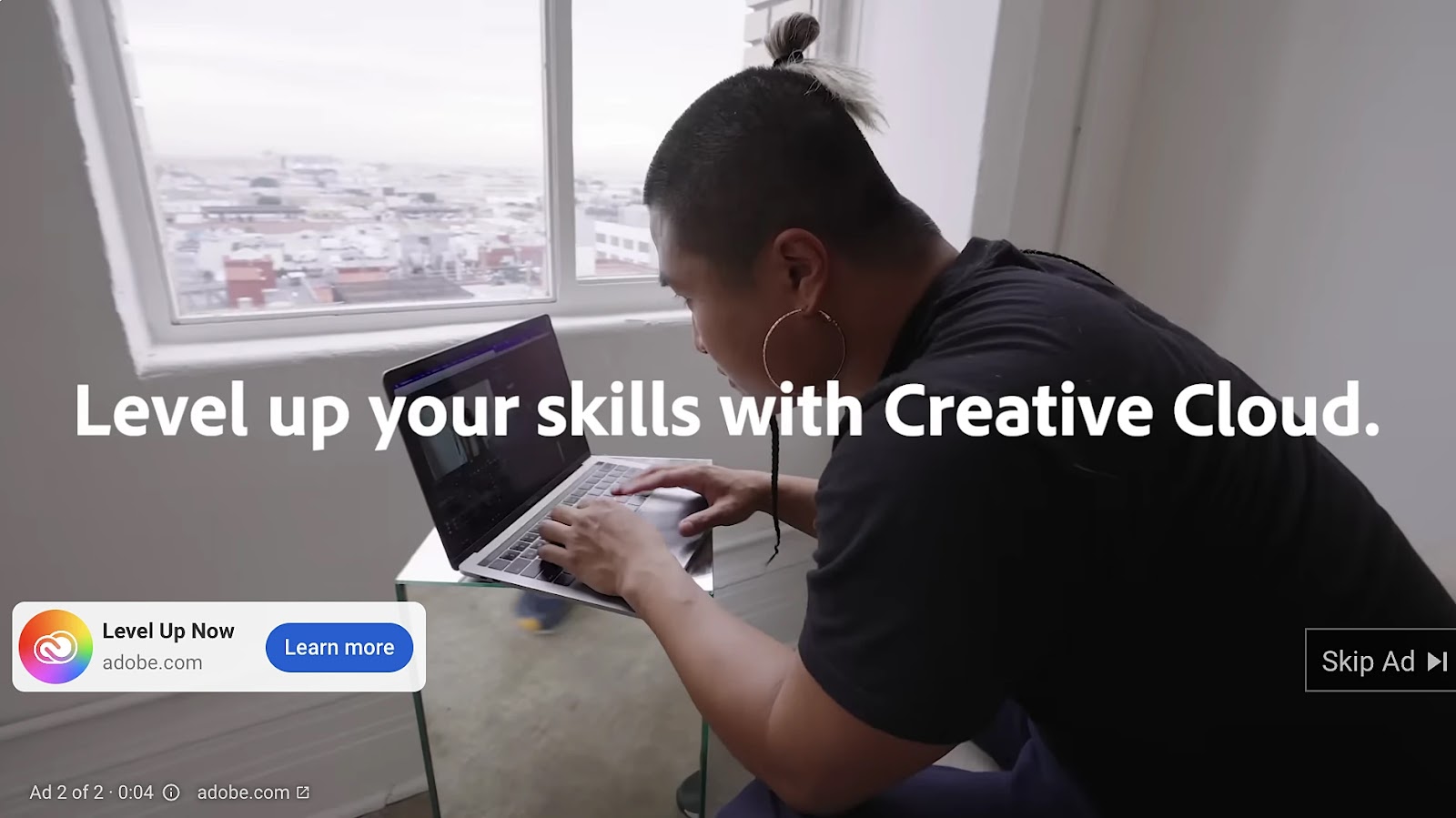 A screenshot from Adobe's video ad for Adobe Cloud